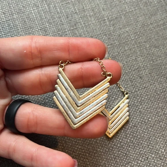 Francesca’s Gold & Silver Hanging Arrow Earrings - Picture 2 of 2